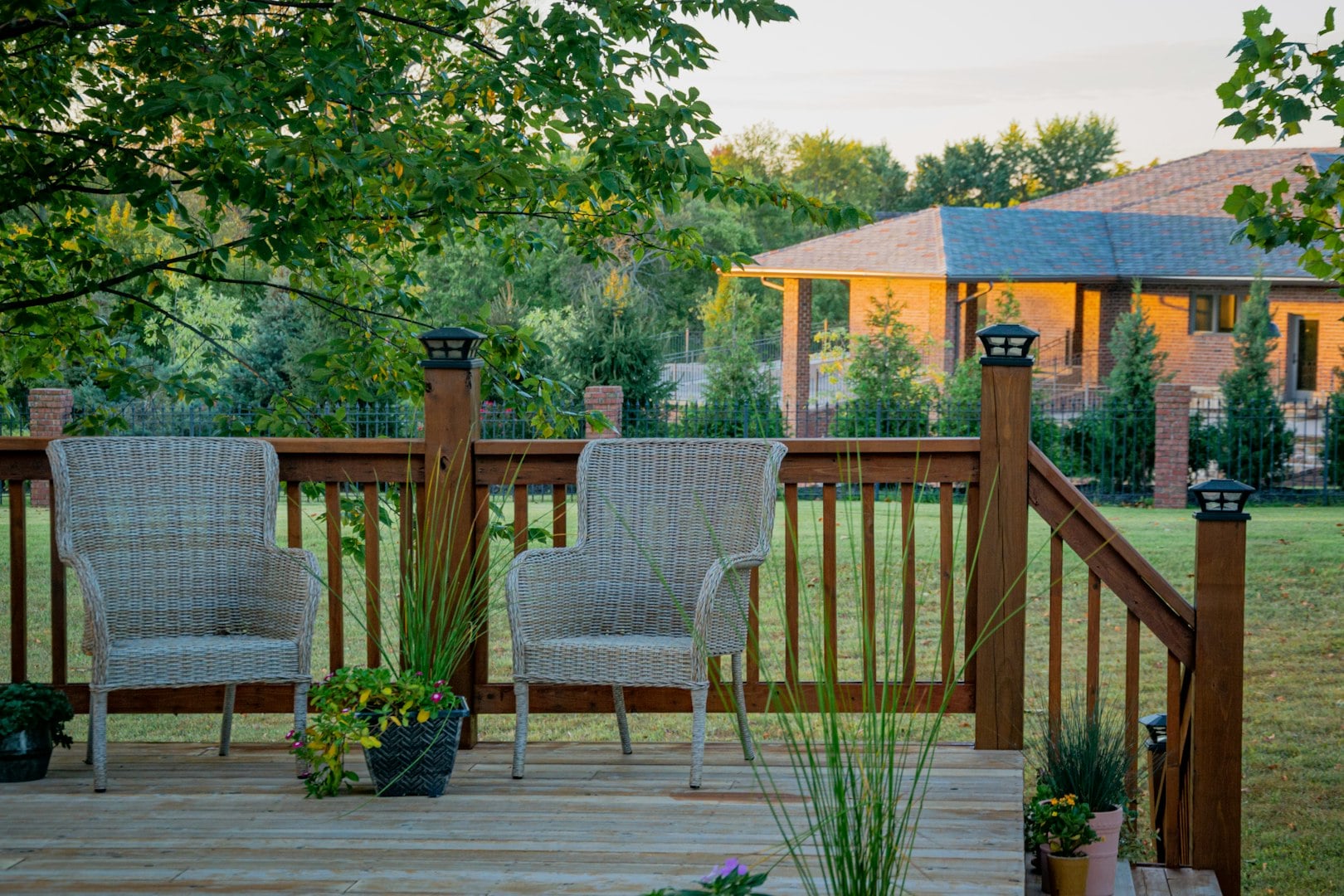 a small wooden structure with a table and chairs